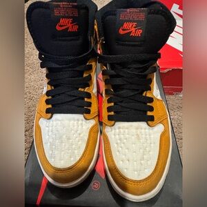 Nike Air High-Tops in Black, White, and Gold